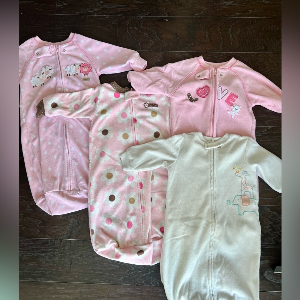 Four girls micro fleece sleep sacks. Good used condition.